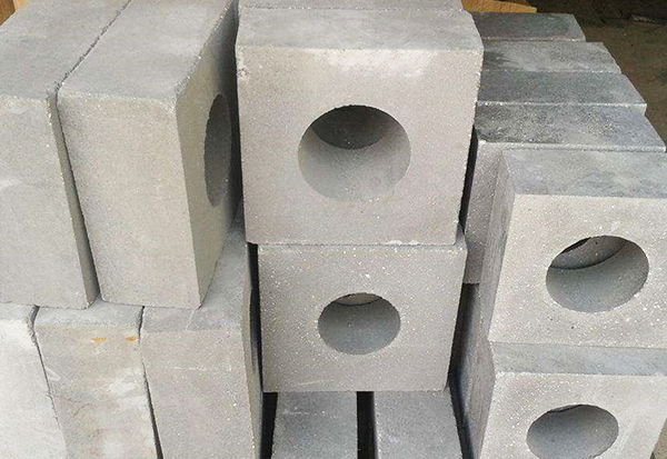 Ladle seat brick, air permeable brick